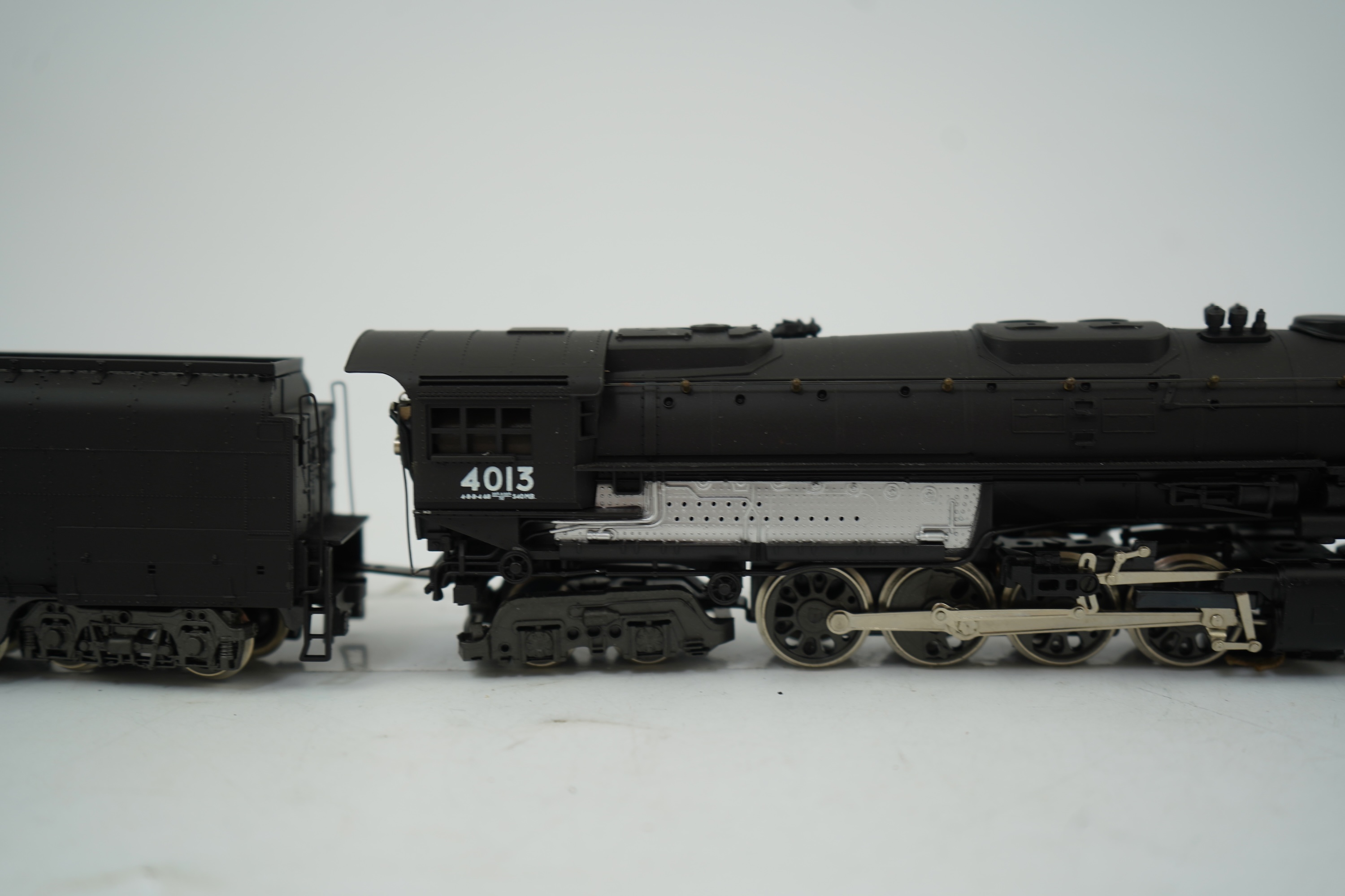 Two HO gauge Union Pacific locomotives; a Rivarossi Big Boy, 4013, 4-8-8-4 tender locomotive, together with LMB Models, Japan, 5093, 4-10-2 locomotive with bogie tender, both powered for two rail operation.